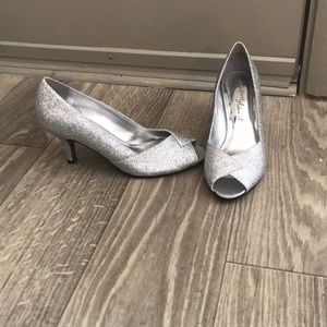 Glittered silver 1 1/2 inch heels.